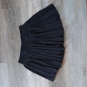 Black Ruffle pleated mini skirt with built in shorts underneath size medium